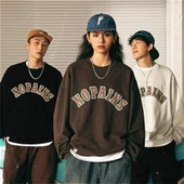 Sweat-shirt brodé en double suède