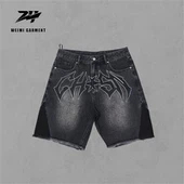 Short en denim lavé en gros brodé